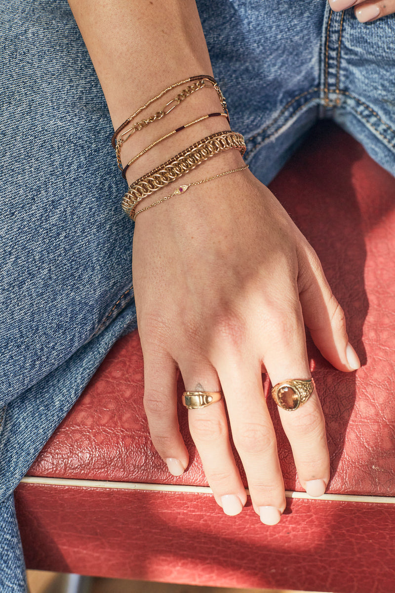 14k gold eye bracelet with ruby