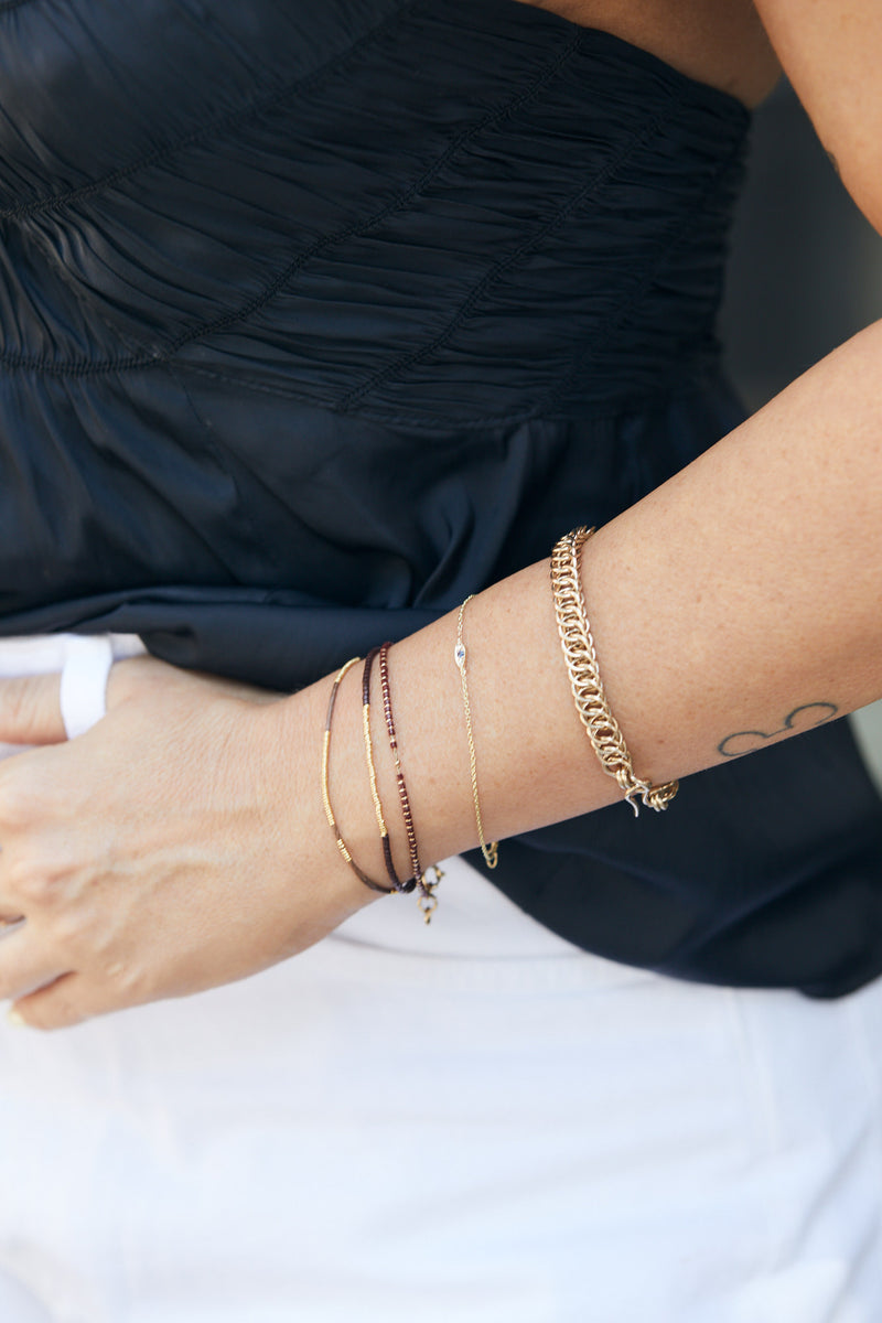 14k gold eye bracelet with ruby