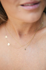14K gold rhombus necklace with black diamonds