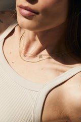 14K gold necklace with a letter (center)-white gold