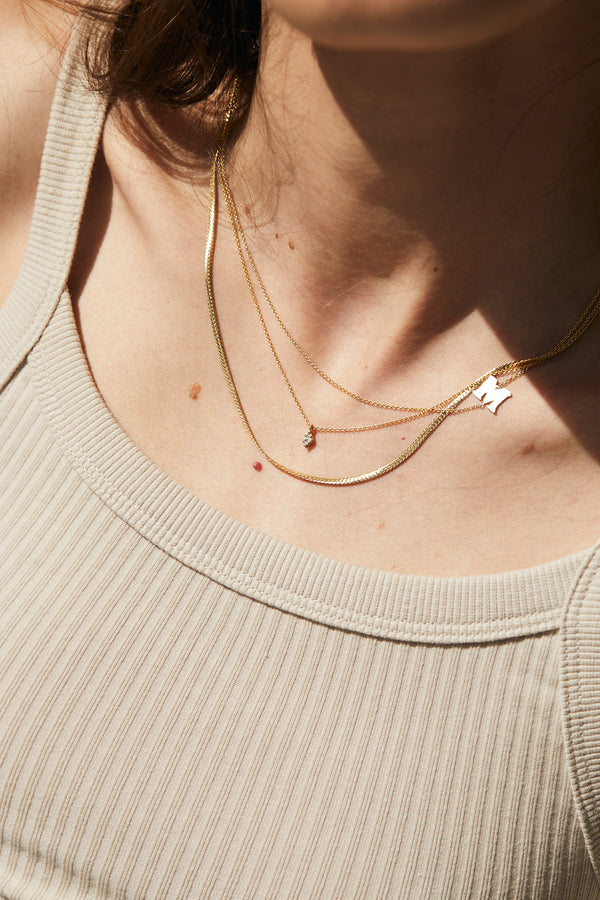 14K gold rhombus necklace with white diamonds