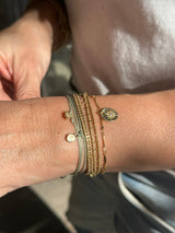 gold plated bracelet with coin