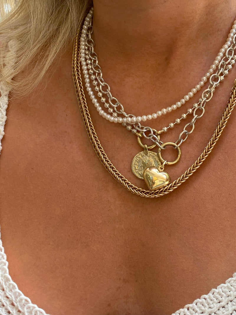 Necklace with silver and 14k gold small coin pendant