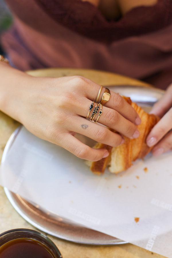 14K gold ring with 5 black diamonds