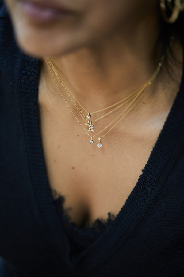 14K GOLD necklace with white diamond