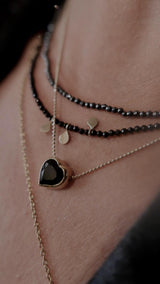 14K gold heart necklace with onyx