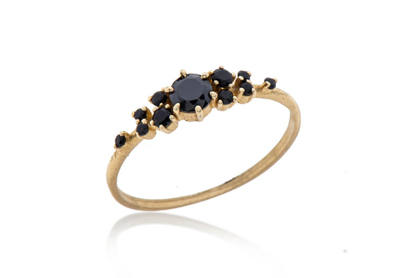 14K gold ring with black stones